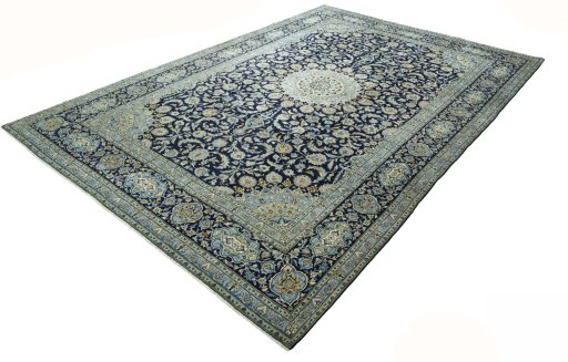 Corner detail of 2000s Kashan rug showing border pattern and Wool pile