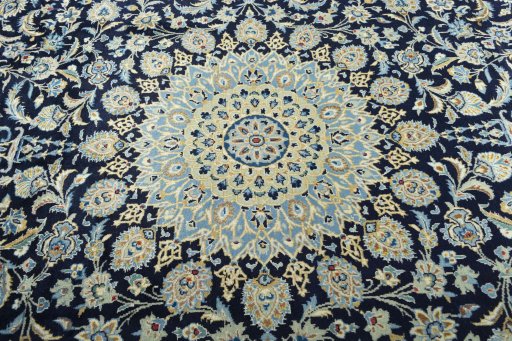 Central medallion detail of 2000s Kashan rug from Iran / Persia