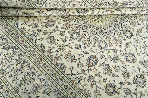 Close-up detail of 2000s Kashan rug from Iran / Persia showing Wool weave