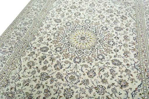 Backside of handmade 2000s Kashan rug showing knot structure and weave density
