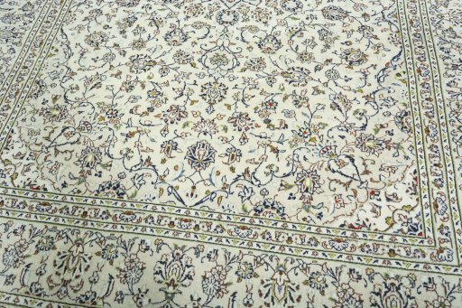 Close-up detail of 2000s Kashan rug from Iran / Persia showing Wool weave