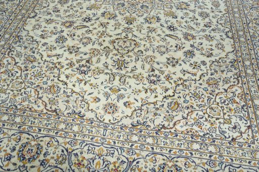 Close-up detail of 2000s Kashan rug from Iran / Persia showing Wool weave