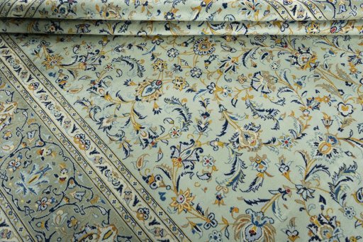Close-up detail of 2000s Kashan rug from Iran / Persia showing Wool weave