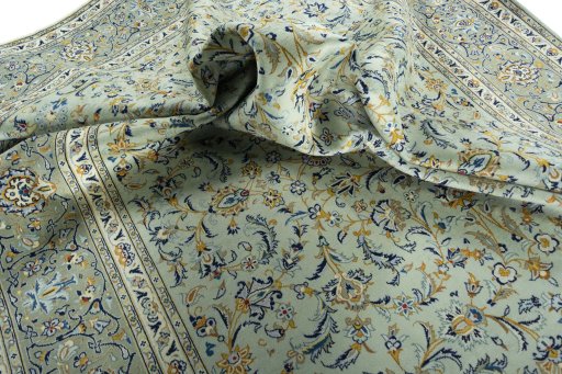 Surface texture of 2000s Kashan rug with natural Wool and intricate pattern