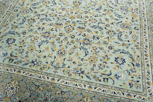 Close-up detail of 2000s Kashan rug from Iran / Persia showing Wool weave