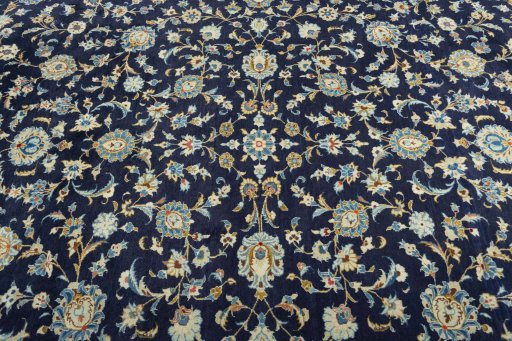 Central medallion detail of 2000s Kashan rug from Iran / Persia