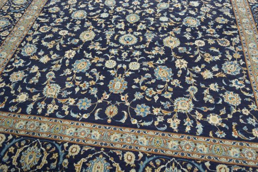 Close-up detail of 2000s Kashan rug from Iran / Persia showing Wool weave