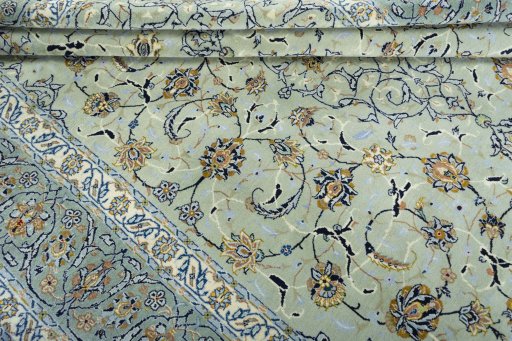 Close-up detail of 2000s Kashan rug from Iran / Persia showing Wool weave