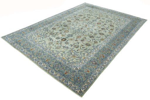 Corner detail of 2000s Kashan rug showing border pattern and Wool pile
