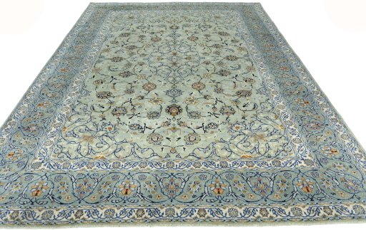 Surface texture of 2000s Kashan rug with natural Wool and intricate pattern