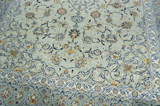 Close-up detail of 2000s Kashan rug from Iran / Persia showing Wool weave