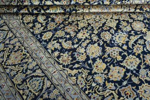Close-up detail of 1970s Kashan rug from Iran / Persia showing Wool weave
