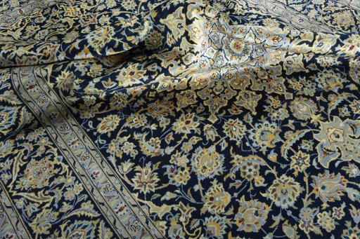 Surface texture of 1970s Kashan rug with natural Wool and intricate pattern