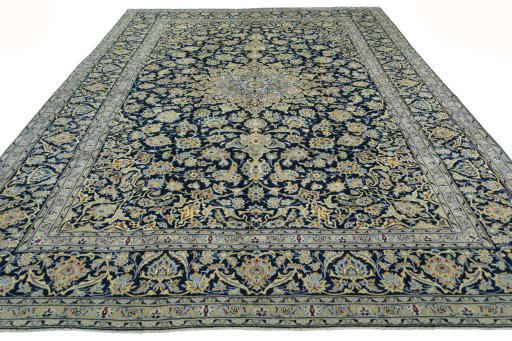 Surface texture of 1970s Kashan rug with natural Wool and intricate pattern