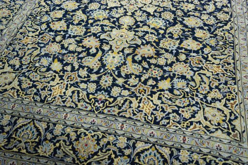 Close-up detail of 1970s Kashan rug from Iran / Persia showing Wool weave