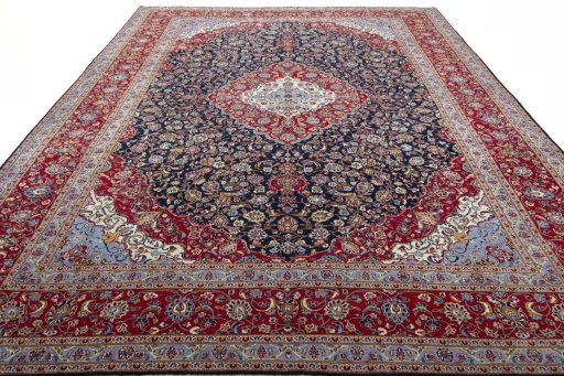 Surface texture of 2000s Kashan rug with natural Wool and intricate pattern