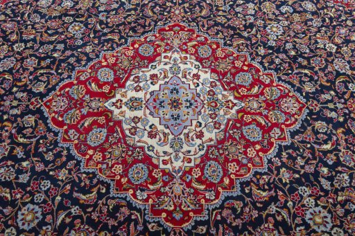 Central medallion detail of 2000s Kashan rug from Iran / Persia
