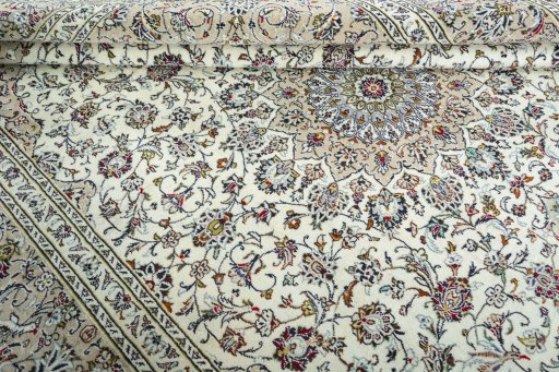 Close-up detail of 2000s Kashan rug from Iran / Persia showing Wool weave