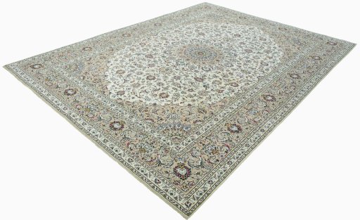 Corner detail of 2000s Kashan rug showing border pattern and Wool pile