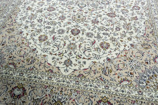 Close-up detail of 2000s Kashan rug from Iran / Persia showing Wool weave
