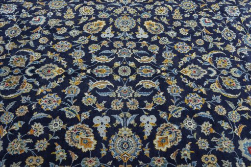 Surface texture of 2000s Kashan rug with natural Wool and intricate pattern