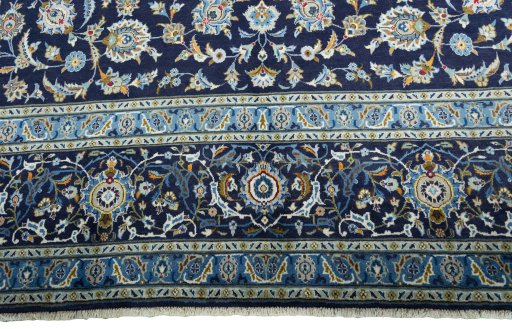 Central medallion detail of 2000s Kashan rug from Iran / Persia