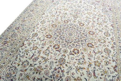 Backside of handmade 1970s Kashan rug showing knot structure and weave density
