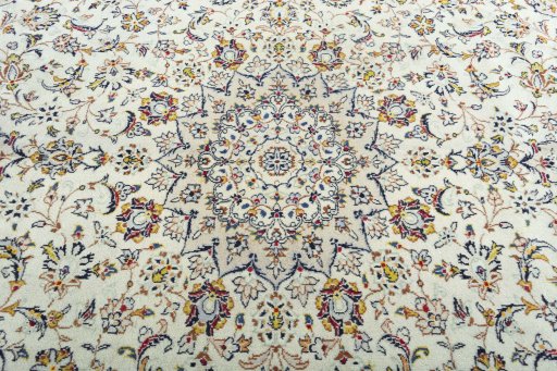 Central medallion detail of 1970s Kashan rug from Iran / Persia
