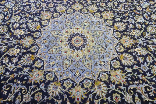 Central medallion detail of 2000s Kashan rug from Iran / Persia