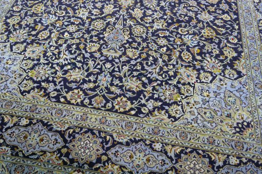 Close-up detail of 2000s Kashan rug from Iran / Persia showing Cork weave
