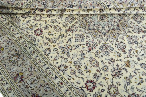 Close-up detail of 2000s Kashan rug from Iran / Persia showing Wool weave