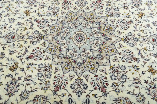 Central medallion detail of 2000s Kashan rug from Iran / Persia