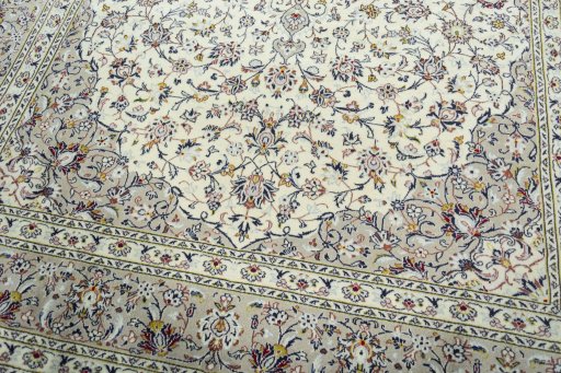 Close-up detail of 2000s Kashan rug from Iran / Persia showing Wool weave