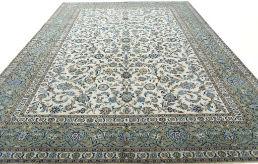 Surface texture of 2000s Kashan rug with natural Wool and intricate pattern