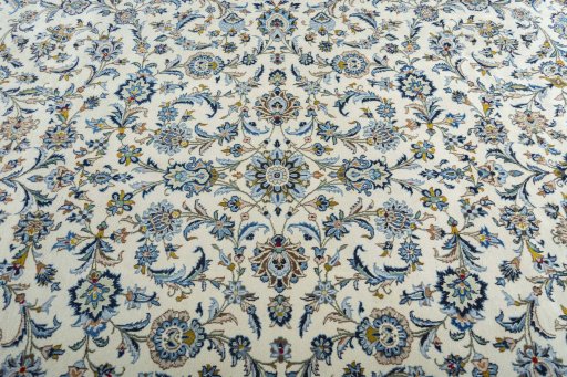 Central medallion detail of 2000s Kashan rug from Iran / Persia