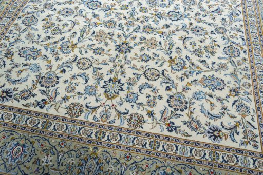 Close-up detail of 2000s Kashan rug from Iran / Persia showing Wool weave