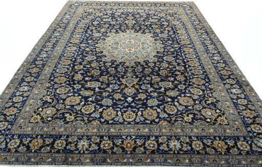 Surface texture of 1970s Kashan rug with natural Wool and intricate pattern