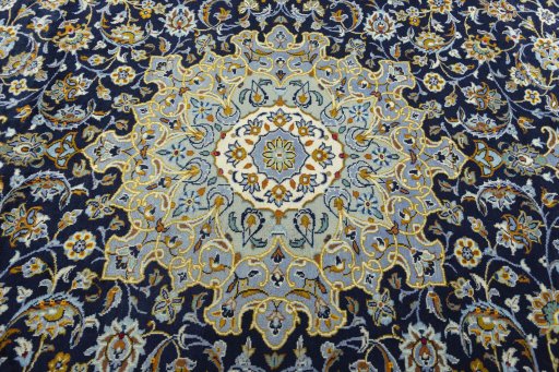 Central medallion detail of 1970s Kashan rug from Iran / Persia