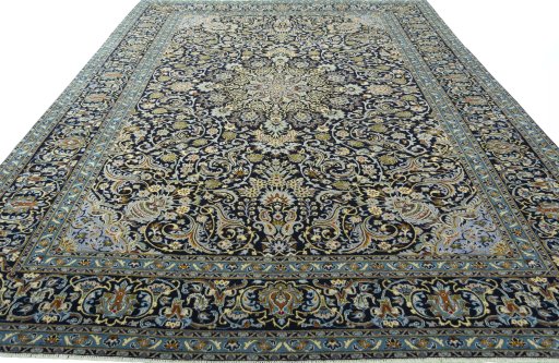 Surface texture of 2000s Kashan rug with natural Wool and intricate pattern