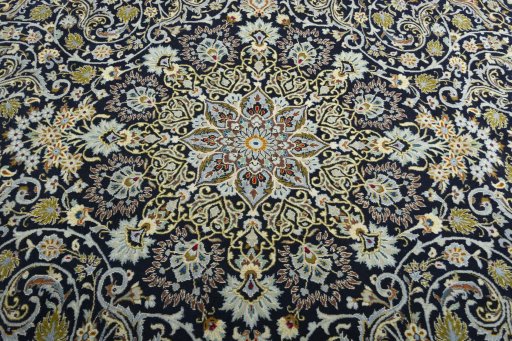 Central medallion detail of 2000s Kashan rug from Iran / Persia