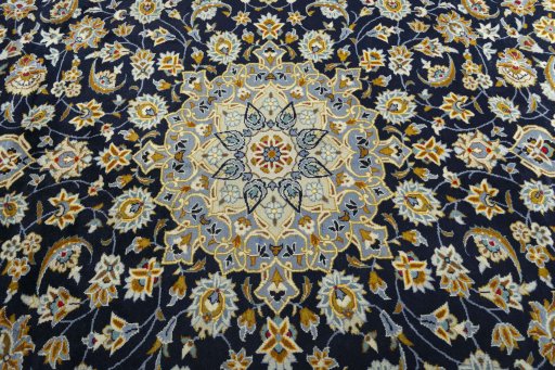 Central medallion detail of 2000s Kashan rug from Iran / Persia