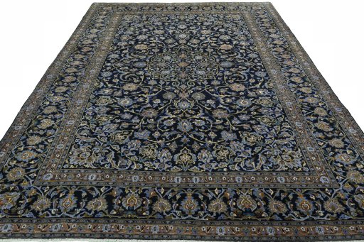 Surface texture of 2000s Kashan rug with natural Wool and intricate pattern