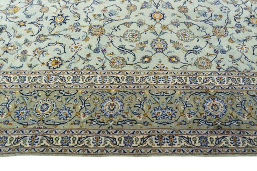 Corner detail of 1970s Kashan rug showing border pattern and Wool pile