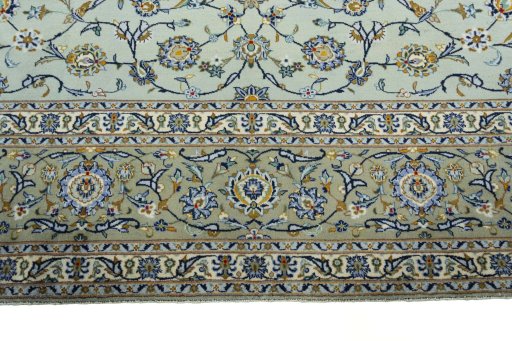 Full view of 1970s Kashan rug from Iran / Persia, 424 × 300 cm in Green tones