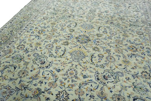 Backside of handmade 1970s Kashan rug showing knot structure and weave density