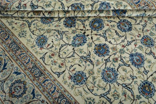 Close-up detail of 2000s Kashan rug from Iran / Persia showing Wool weave