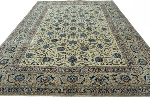 Surface texture of 2000s Kashan rug with natural Wool and intricate pattern
