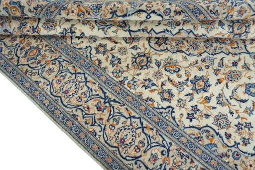 Close-up detail of 2000s Kashan rug from Iran / Persia showing Wool weave