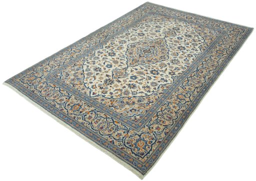 Corner detail of 2000s Kashan rug showing border pattern and Wool pile