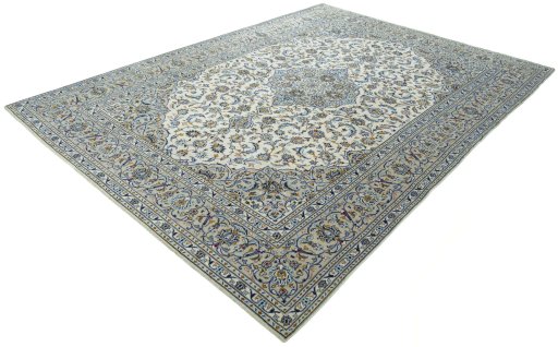 Corner detail of 2000s Kashan rug showing border pattern and Wool pile